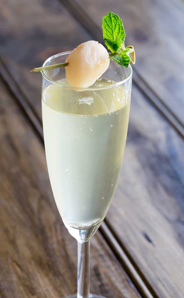 Lychee Ginger Fizz. An amazingly refreshing yet warming cocktail that is perfect in any season!