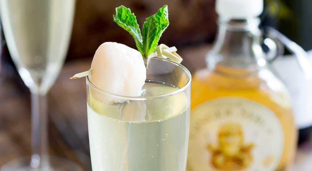 Lychee Ginger Fizz. An amazingly refreshing yet warming cocktail that is perfect in any season!