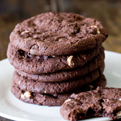 5 cookies stacked together on a plate