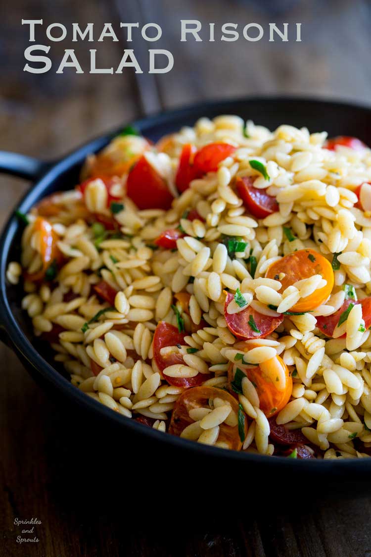This Tomato Risoni Salad (Tomato Orzo Salad) is a super simple salad that is packed with flavour and works as a side or a main meal. You can add extra veg, meat, cheese what ever you fancy to this salad. It is delicious and perfect for summer or winter!