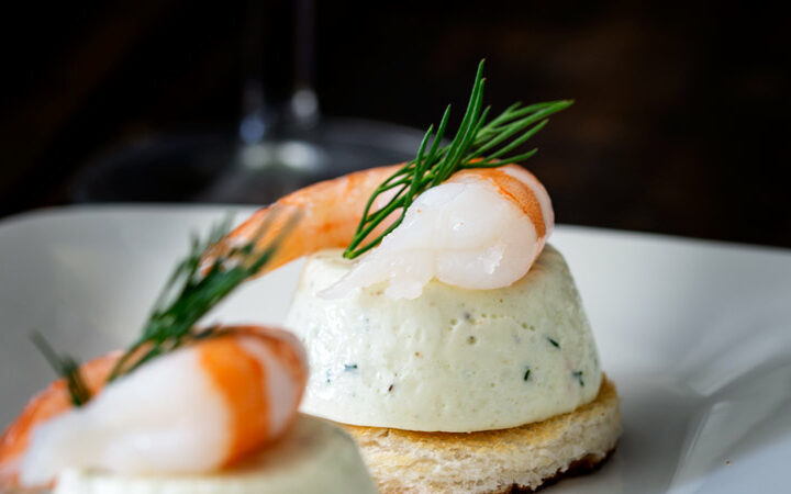 Cucumber Mousse And Dill Prawn Bites are sublime. The subtle and refreshing taste of cucumber combined in a soft heavenly mousse, sat on top of a crispy toast circle and topped with a succulent prawn and the freshness of dill.