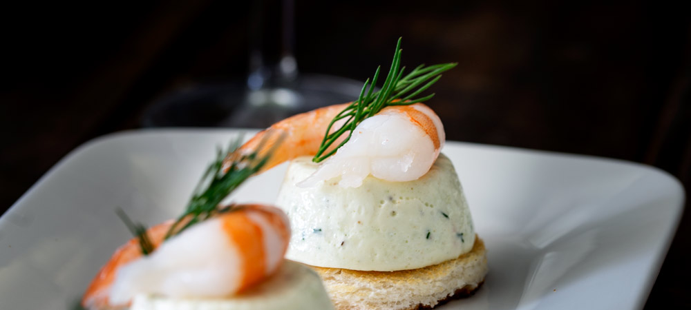 Cucumber Mousse And Dill Prawn Bites are sublime. The subtle and refreshing taste of cucumber combined in a soft heavenly mousse, sat on top of a crispy toast circle and topped with a succulent prawn and the freshness of dill.