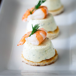 These Cucumber Mousse And Dill Prawn Bites are sublime. The subtle and refreshing taste of cucumber combined in a soft heavenly mousse, sat on top of a crispy toast circle and topped with a succulent prawn and the freshness of dill.