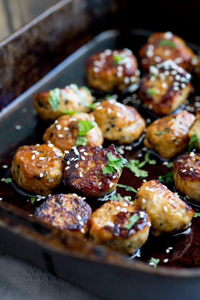 Sweet, sticky and delicious. These tray baked sticky sesame chicken meatballs are packed with flavour and bake easily in the oven for a perfect week night meal.