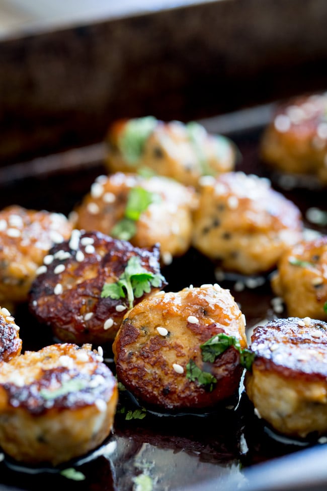 Sweet, sticky and delicious. These tray baked sticky sesame chicken meatballs are packed with flavour and bake easily in the oven for a perfect week night meal.