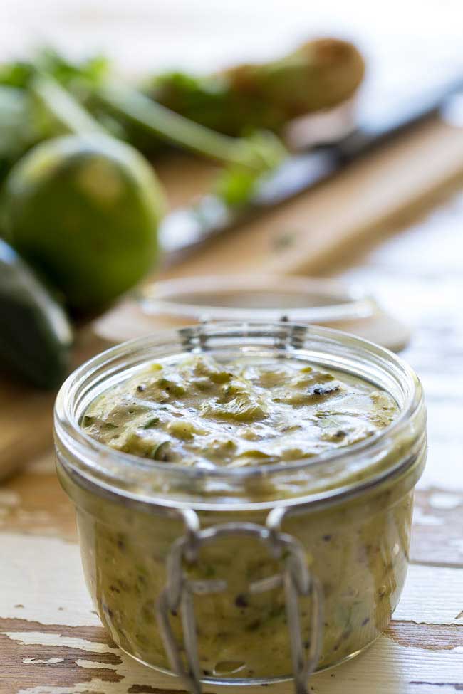 This mild Green Enchilada Sauce is made with roasted green chiles and a few easy to find herbs and spices. It is delicious, fresh and so simple to make that once you have tried it you will never reach for a can of sauce again. Get a batch made and enjoy the best green enchiladas this Cinco De Mayo.
