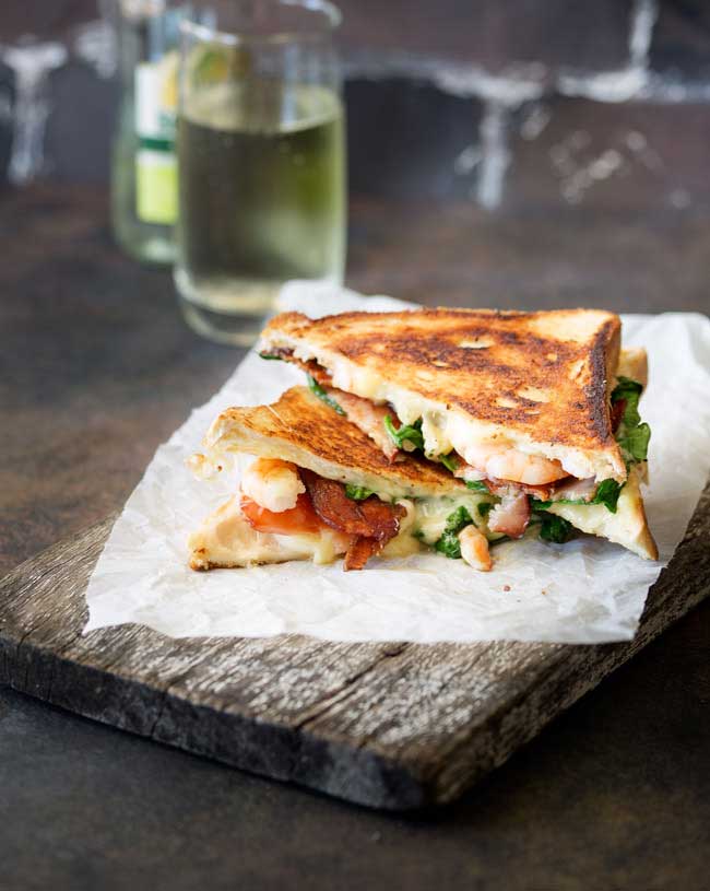 Is there anything more comforting that a grilled cheese sandwich??? And this shrimp and bacon grilled cheese sandwich takes the humble grilled cheese up a level! This is a gourmet grilled cheese sandwich!