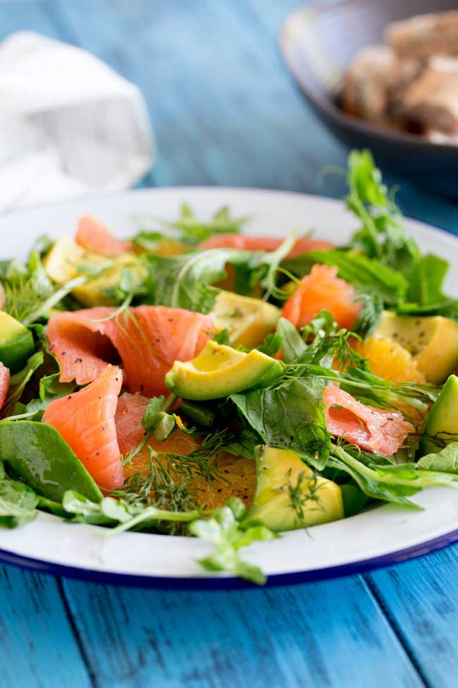 Smoked Salmon, Sweet orange, peppery leaves, fresh herbs and creamy avocado. This smoked salmon, orange and avocado salad is packed with flavours and textures. So delicious and so beautiful it is sure to become a firm favourite.