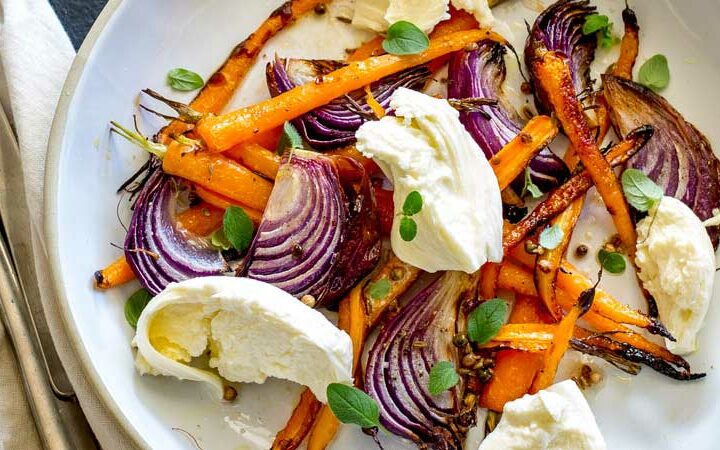 Sweet sticky caramelised vegetables, a spiced vinaigrette and soft smooth milky mozzarella. This Spiced Carrot, Red Onion and Mozzarella Salad is the salad for people who don't like salad. The carrots are nutty and sweet, the onion is sticky and fragrant, the dressing perks everything up and then then mozzarella calms and cools. The perfect salad for so many occasions. From Sprinkles and Sprouts.