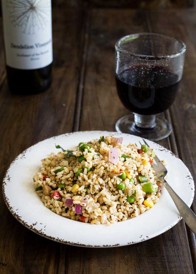 Nutty brown rice, sweet crunch vegetables and flavour packed herbs. This brown rice salad is not your average salad. It is nutritious and delicious. From Sprinkles and Sprouts