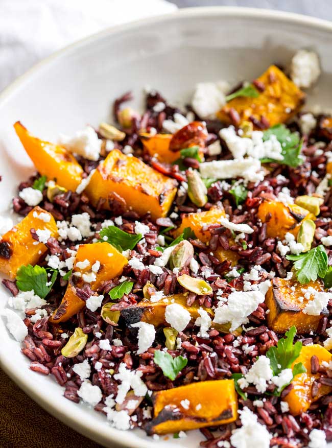 This Black Rice, Goats Cheese and Maple Roasted Pumpkin Fall Salad has it all!!! Nutty sweet black rice, sweet smoky pumpkin, fresh tangy goats cheese, sweet cranberries and crunchy pistachios. Delicious as a main or a side, this is the perfect dish for fall. From Sprinkles and Sprouts.