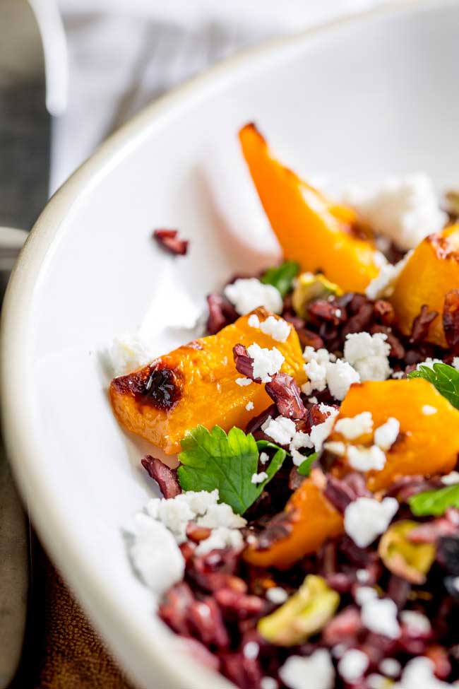 This Black Rice, Goats Cheese and Maple Roasted Pumpkin Fall Salad has it all!!! Nutty sweet black rice, sweet smoky pumpkin, fresh tangy goats cheese, sweet cranberries and crunchy pistachios. Delicious as a main or a side, this is the perfect dish for fall. From Sprinkles and Sprouts.