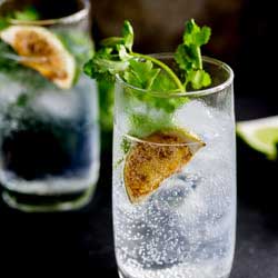 This Charred Lime Gin & Tonic with Fresh Coriander takes the fabulous pairing of gin and lime, boosts it up and then adds to the botanicals with fresh coriander. It is a delicious and unusual Gin & Tonic, but one definitely worth giving a try.  From Sprinkles and Sprouts