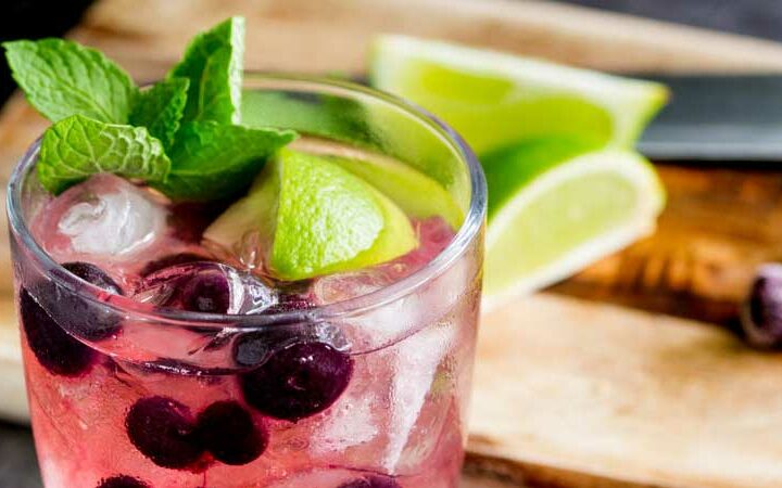 Slight sweet blueberries with tart lime and the zing of mint. This Blueberry, Lime and Mint muddled gin and tonic is the perfect balance of flavours. From Sprinkles and Sprouts