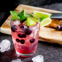 Slight sweet blueberries with tart lime and the zing of mint. This Blueberry, Lime and Mint muddled gin and tonic is the perfect balance of flavours. From Sprinkles and Sprouts