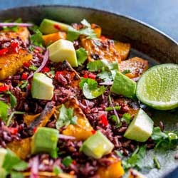 This Mexican Black Rice and Pumpkin Salad is packed with flavour. Honey and Cumin Roasted Pumpkin, nutty sweet black rice, creamy avocado, spicy chilli, zingy lime and fabulous fresh coriander. So many fabulous flavours that make this salad a taste explosion. From Sprinkles and Sprouts #SundaySupper