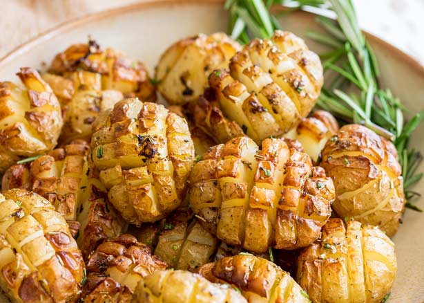 These Hedgehog Roasted Rosemary Potatoes are the most delicious and beautiful side dish. Crispy on the outside, buttery and soft inside and packed with rich rosemary flavours, they are a dinner time treat and would be perfect for any occasion.
