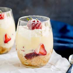 Individual Strawberry Trifle in wine glasses.