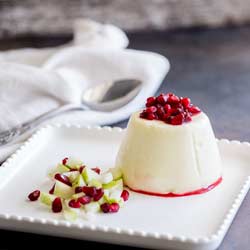This Pear and Pomegranate Panna Cotta is rich and creamy with a deliciously fruity festive edge. The colours pop on the plate making this make ahead dessert is perfect for entertaining. Recipe from Sprinkles and Sprouts | Delicious food for Easy Entertaining