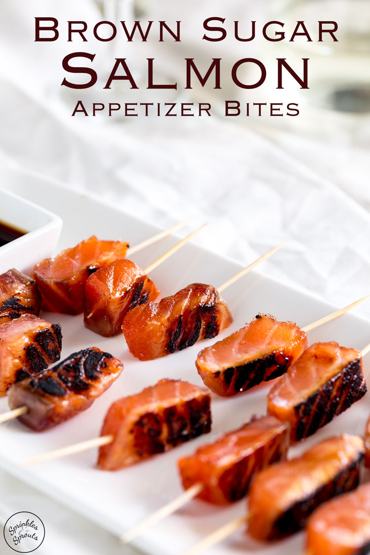 This cured brown sugar salmon is a stunning yet simple appetizer idea. The gorgeous deep orange of the salmon contrasts to the black char, and then the flavour! You will be blown away with the sweet and salty salmon. This is decadent, delicious and dazzling party food! Recipe by Sprinkles and Sprouts | Delicious Food for Easy Entertaining