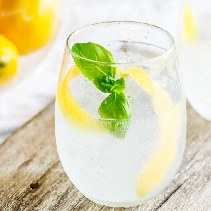 Lemon and Basil Gin and Tonic | Gin and lemon is such a classic combination but the addition of herbaceous basil means this Gin and Tonic pops with a wonderfully different flavor. This lemon and basil G&T is refreshing and unusual take on your normal G&T. 