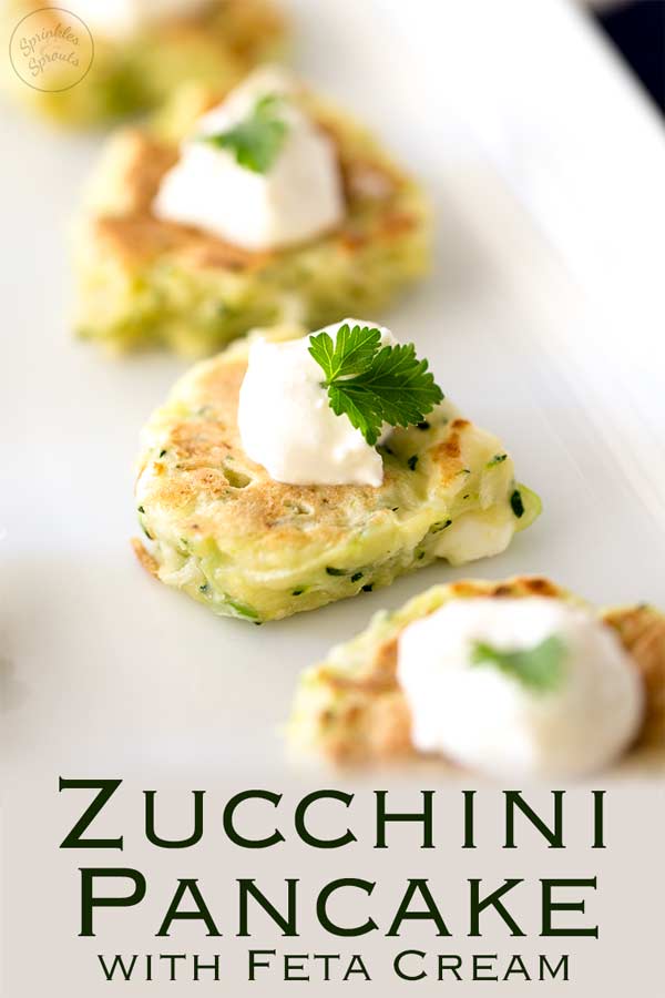 Pinterest image, long platter showing several zucchini pancakes with text at the bottom