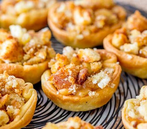 Super close up on the crisp golden donut crumb topping