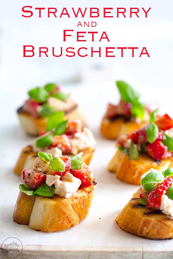 Pin image, text at the top and then a close up on the bruschetta, showing the bright colours of the topping.