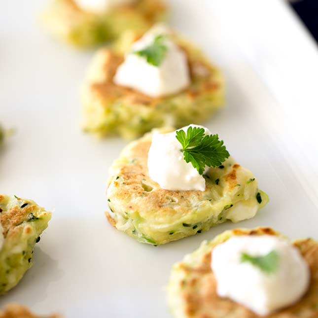 https://www.sprinklesandsprouts.com/wp-content/uploads/2018/07/NEW-FEATURE-Zucchini-Pancake-with-Feta-Cream.jpg