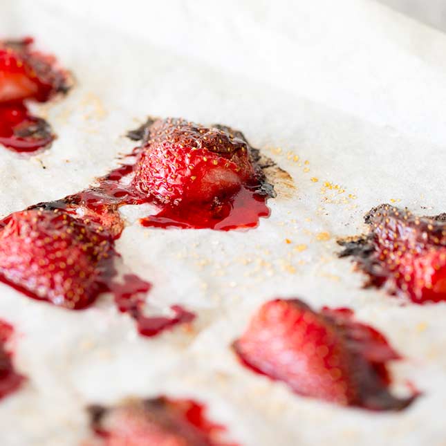Close up on the caramelisation on the roasted strawberries