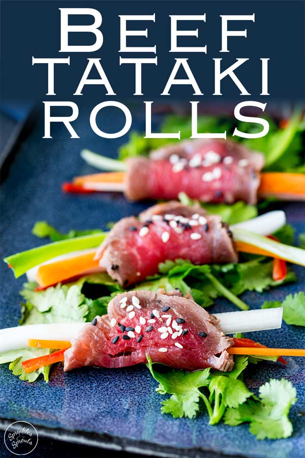 for pinterest showing a close up on 3 beef tataki rolls on a blue plate with text at the top