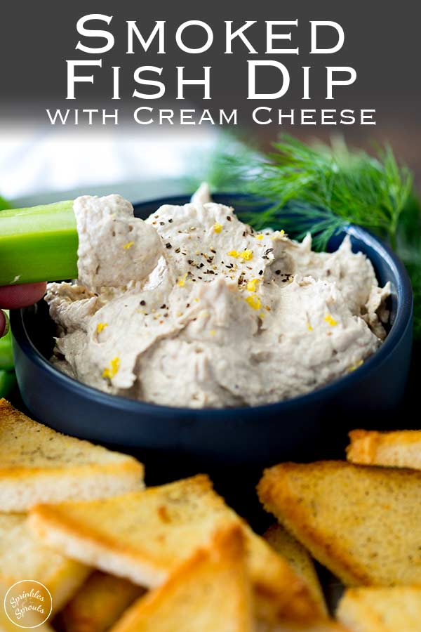 close up on a celery button stopping up the creamy smoked fish dip. Text at the top of the image