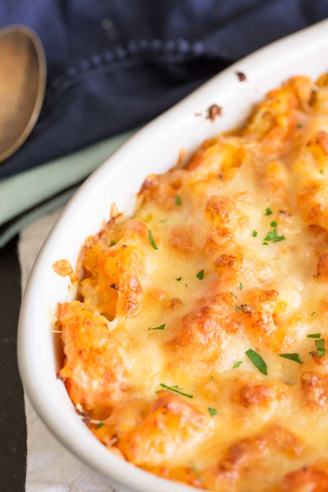 overhead with a close up on the cheesy topping of this casserole