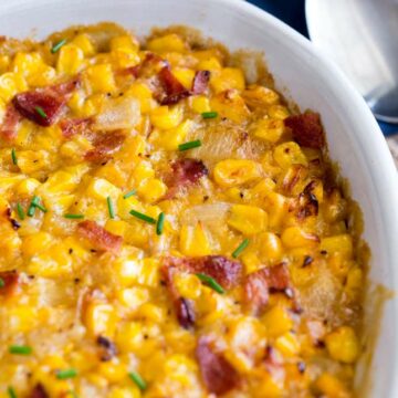 sq photo showing a close up of the crust and crispy bacon on top of this creamed corn casserole.