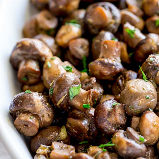 close up on the garlic mushrooms in the slow cooker