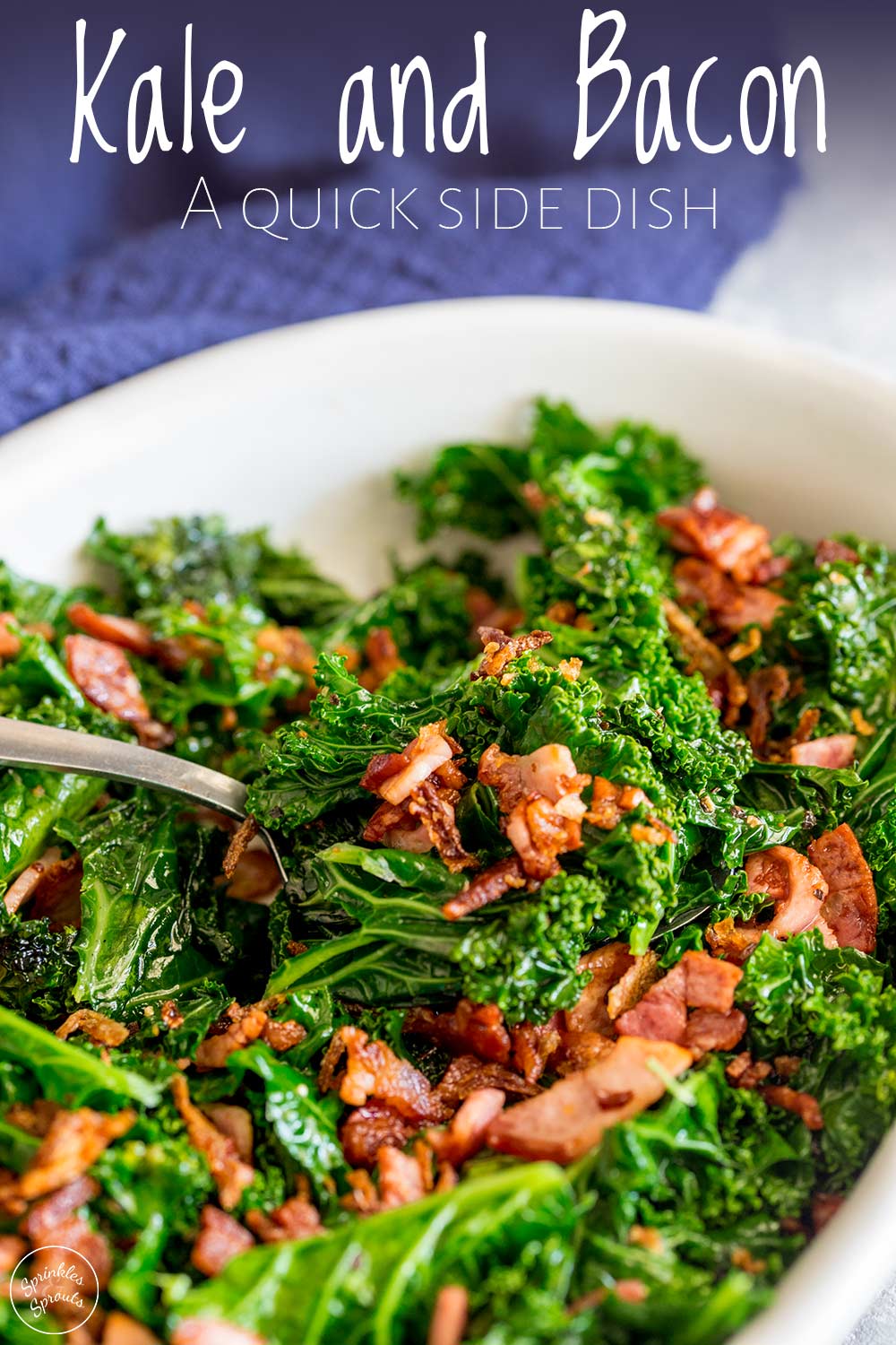White bowl of sautéed kale with bacon, with text at the top