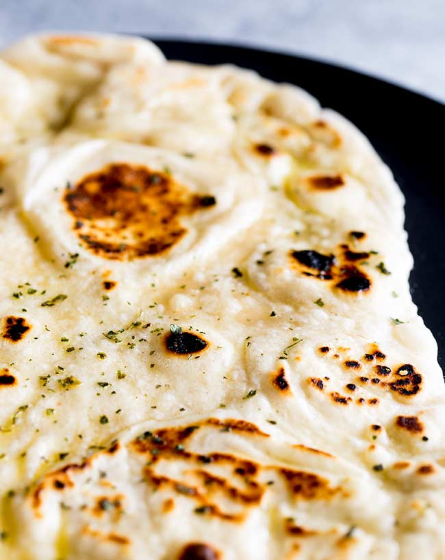 close up on the blackened spots on the naan bread