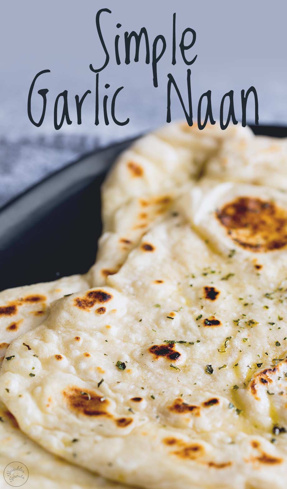 close up on a garlic naan with text at the top