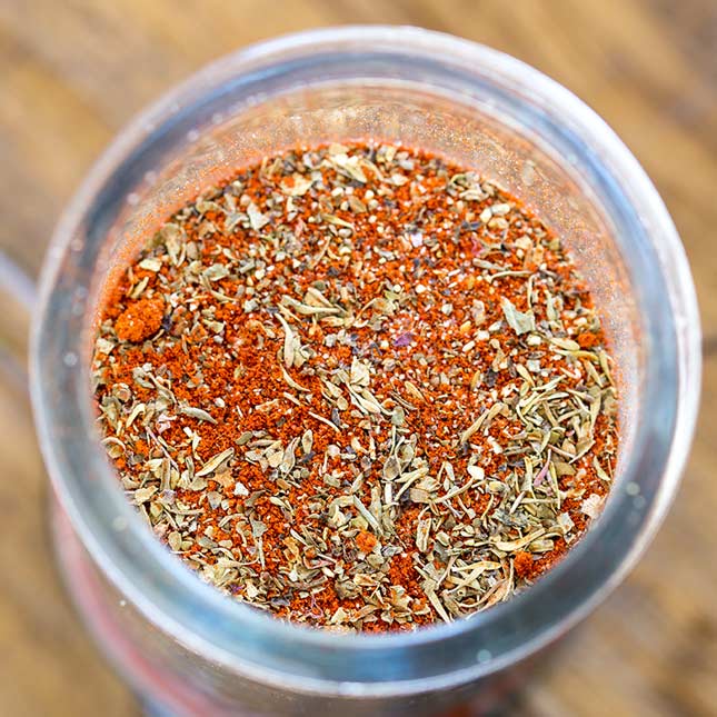 close up of the inside of a jar of creole seasoning