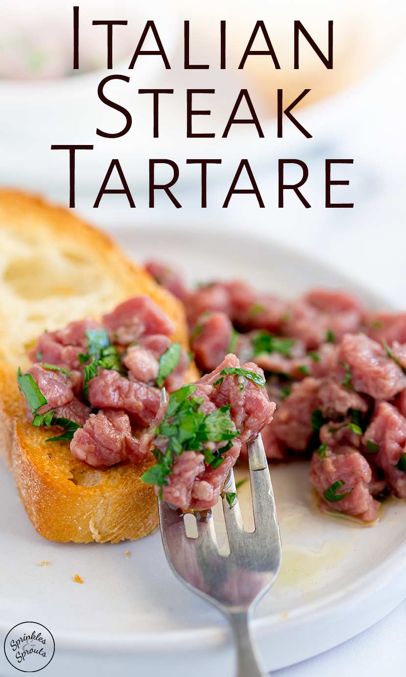 close up on the fork full of Italian steak tartare with text at the top