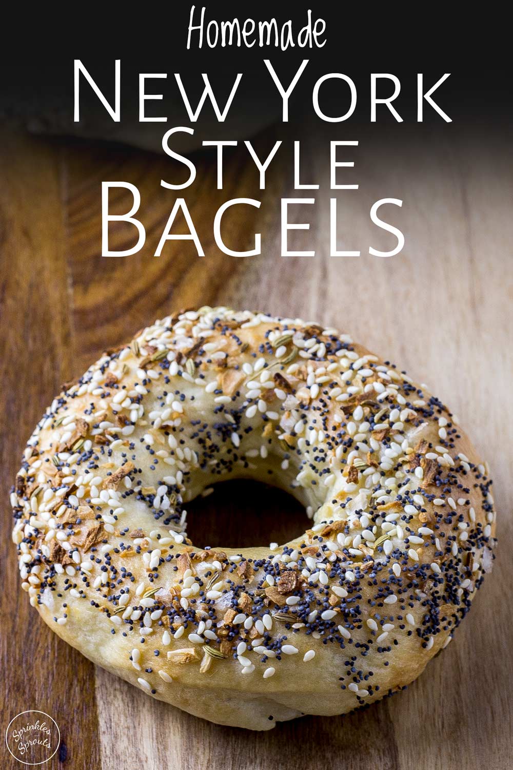 close up of an everything bagel with text at the top