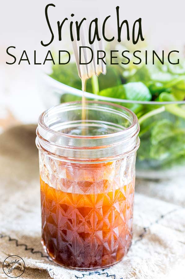 a fork stirring a salad dressing with text at the top