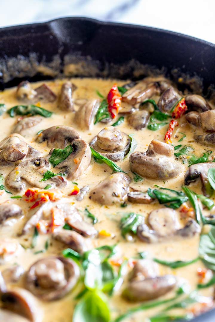 close up on the mushrooms in a creamy sauce
