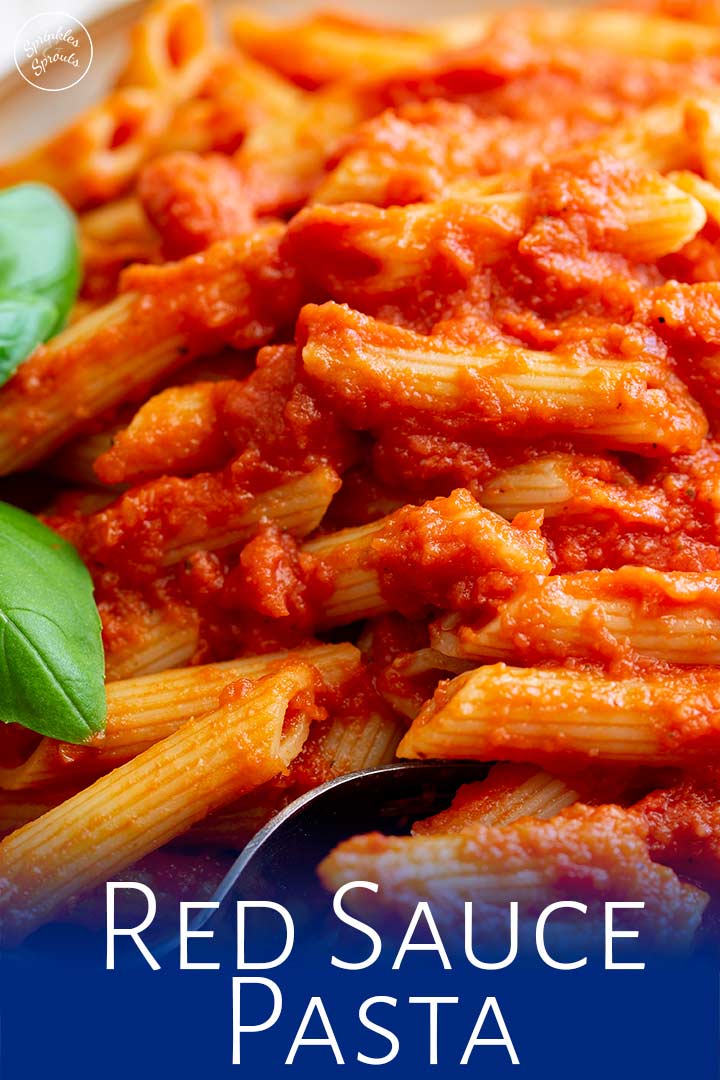 A Fork in a bowl of Red Sauce Pasta with text at the bottom