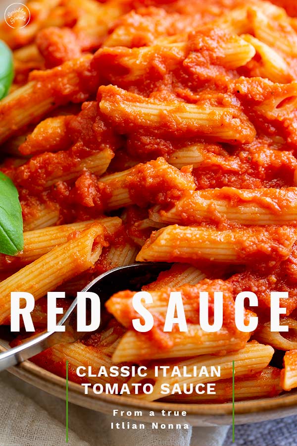 A Fork in a bowl of Red Sauce Pasta with text at the bottom