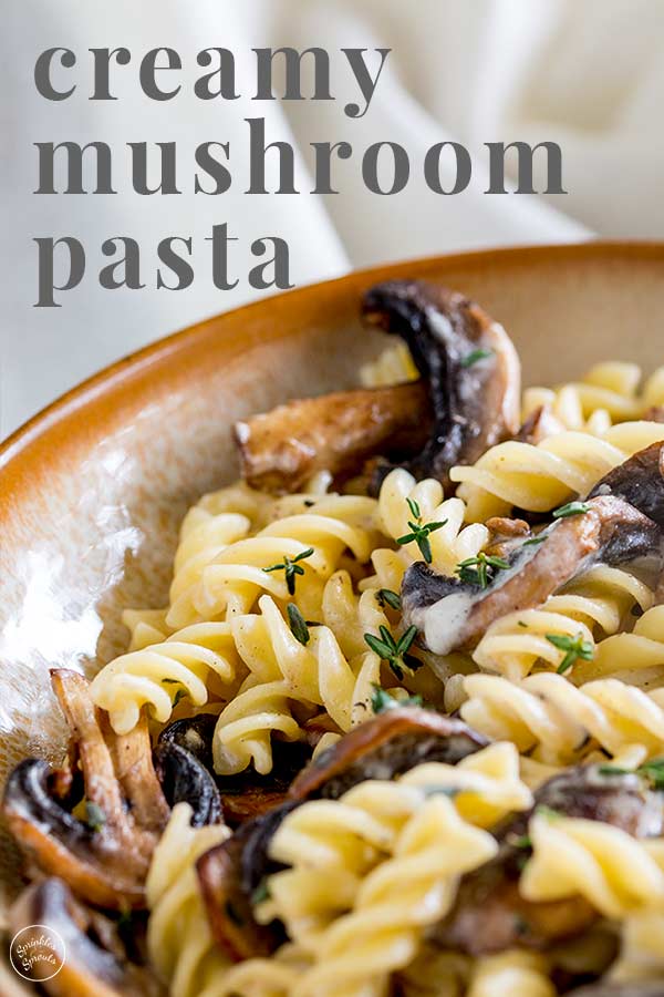 close up on mushroom pasta with text at the top