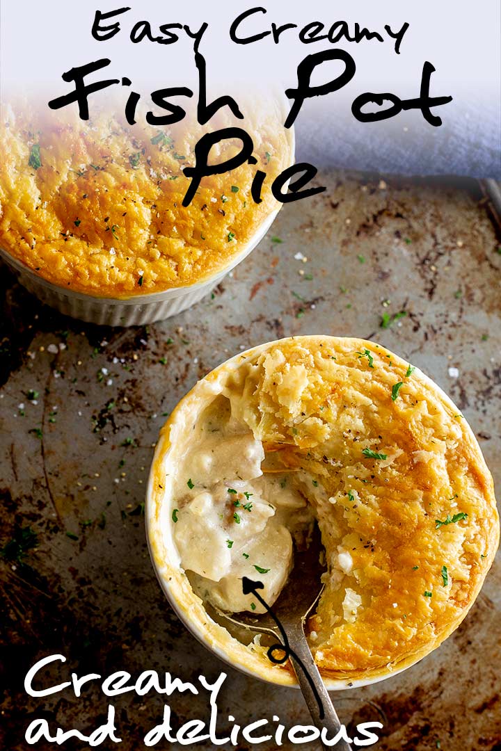 two pot pies on a metal tray, one with a spoon lifting out the fish filling with text at the top and bottom