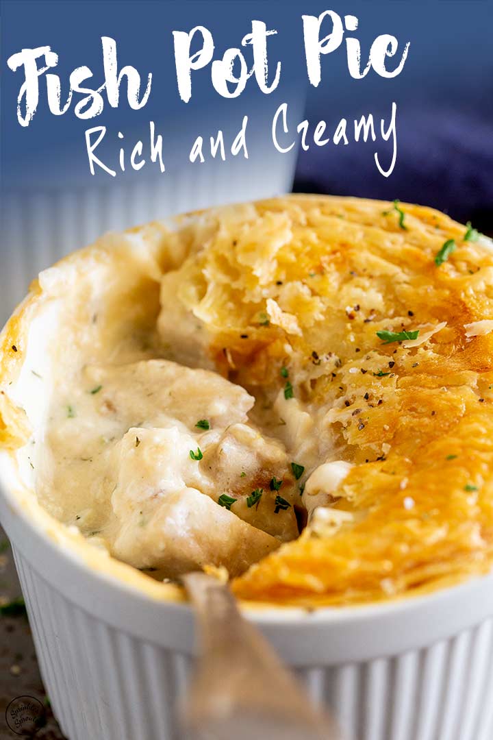 a spoon lifting up the creamy fish filling from a pot pie, with text at the top