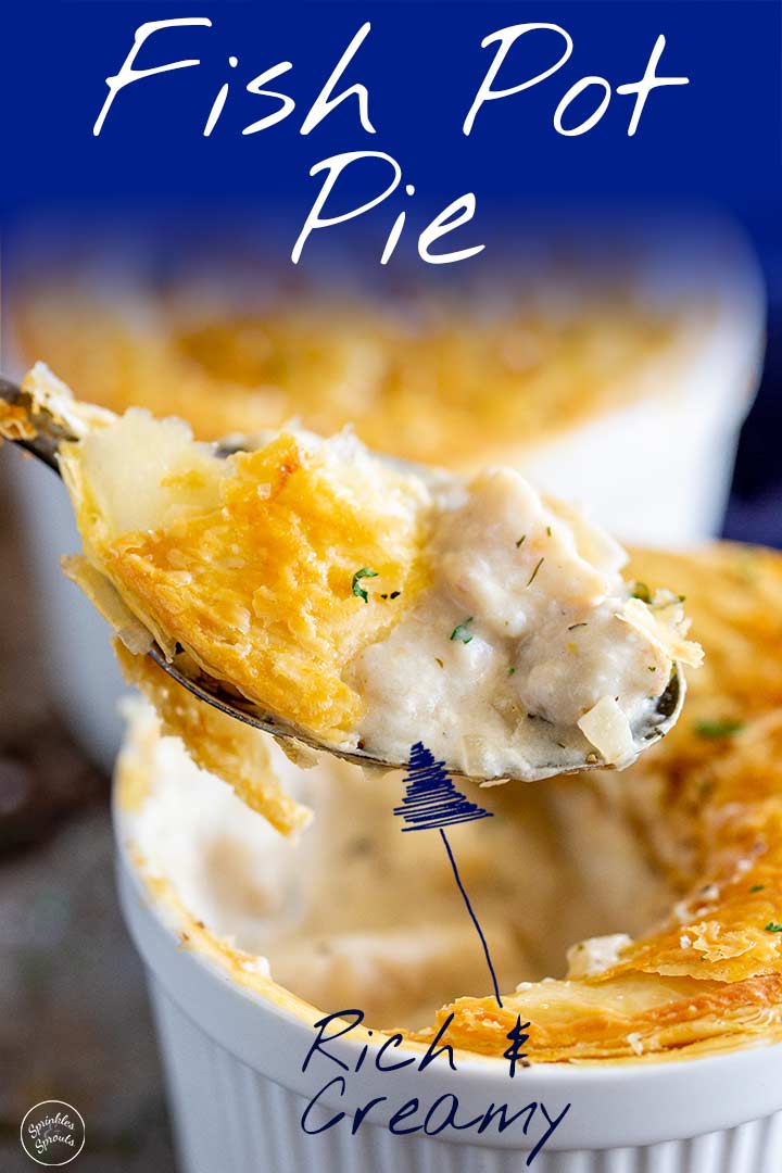 A spoon lifting up some fish pie from a ramekin with text at the top and bottom