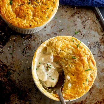 overhead shot of a fish pot pie with a spoon in it